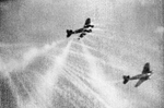 Gun camera footage from a Spitfire Mk I fighter of No. 609 Squadron RAF, showing its tracer ammunition hitting a German He III aircraft over Filton, Bristol, England, United Kingdom, 25 Sep 1940