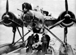 He 115 C4 aircraft loading a LT F 5b practice torpedo, date and location unknown, photo 2 of 2
