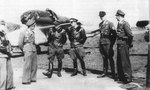 He 162 pilots of JG1 at Leck, standing in front of their jet fighters, Germany, Apr 1945