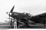 German crew servicing a Ju 87 Stuka aircraft, 1942-1944; note 3.7-cm anti-tank guns mounted under wings