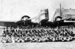 Middle school children in Taiwan taking a group photograph with a visiting Japanese Army Ki-2 bomber and crew, date unknown
