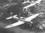 Two Ki-32 aircraft in flight over hilly terrain, date unknown
