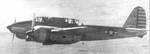 Captured Ki-45 aircraft with American markings in flight, date unknown, photo 1 of 3
