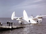 An US Navy beaching crew pulling a PBM-3S Mariner of patrol squadron VPB-206 out out the water, 1944-1945