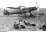 German Luftwaffe crew relaxing on an airfield, 1939-1940; note Bf 109 fighter of JG 53 