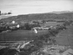 Toyohara Airfield under US parafrag attack, Taichu (now Taichung), Taiwan, 1945, photo 1 of 2