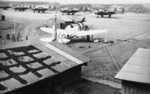 P-61 Black Widow night fighters and a P-47 Thunderbolt fighter at Kipapa Army Air Field, Oahu, US Territory of Hawaii, 1945