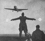 British Skua aircraft approaching a carrier for landing, date unknown