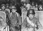 Japanese paratroopers of Kaoru Airborne Raiding Detachment inside a L2D aircraft, 26 Nov 1944; person in aisle with glasses was identified as Lieutenant Takashi Kaku