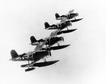 SOC-3 Seagull aircraft from cruiser Portland flying in a formation of four, circa 1944, photo 2 of 2