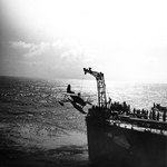 SOC Seagull aircraft being recovered by cruiser Philadelphia, off North Africa, Nov 1942, photo 2 of 4