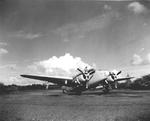 US Navy sailor performing routine maintenance on a PV-1 Ventura aircraft of squadron VB-141 at Hato Field, Curaçao, Netherlands West Indies, Nov 1943