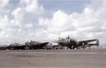 Crews providing maintenance to PV-1 Ventura patrol bombers of US Navy squadron VPB-147 at NAS Isla Grande, San Juan, Puerto Rico, Jun 1944; note rocket rails mounted under the wings