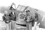 American airmen with a P-40E Kittyhawk fighter in China, date unknown