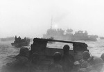 Destroyer USS Pruitt and landing craft from USS Heywood moving toward Massacre Bay, Attu, Aleutian Islands, US Territory of Alaska, 11 May 1943