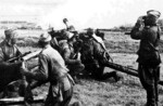 Russian artillery firing on Japanese positions near Hailar, Manchuria, Aug 1945