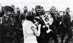 Soviet officer receiving flowers from a civilian in Lithuania, Jun 1940