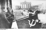 Soviet troops flying a flag atop Hotel Adlon on Unter den Linden, Berlin, Germany, May 1945