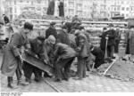 German civilians building a roadblock near the Hermannstraße S-Bahn station, Berlin, Germany, 10 Mar 1945, photo 3 of 6