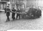 German civilians building a roadblock near the Hermannstraße S-Bahn station, Berlin, Germany, 10 Mar 1945, photo 1 of 6
