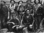 Engineers of the Australian 2/13 field company resting aboard a landing craft after a failed attempt to reach coastal wire defenses off Lingkas, Tarakan, Borneo, 30 Apr 1945