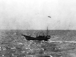 Japanese fishing boat sinking after being attacked by the Doolittle raiders, 18 Apr 1942