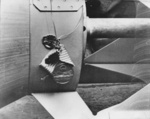 Close-up view of the medal James Doolittle tied to the fins of a 500-pound bomb being readied for the Doolittle Raid, 18 Apr 1942, photo 1 of 2