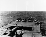 B-25 Mitchell bomber and F4F-3 Wildcat fighters on the flight deck of USS Hornet while en route toward Japan, Apr 1942, photo 1 of 2