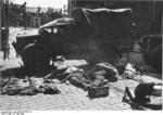 Dead British soldiers in Calais, France, at 1330 hours on 27 May 1940; note Bedford MW truck