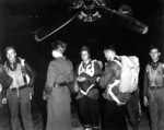 Operation Jedburgh personnel preparing for their delivery into France via a B-24 aircraft, Area T, RAF Harrington, Kettering, Northamptonshire, England, United Kingdom, circa 1944