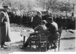 German officers speaking to Frenchmen suspected of being members of the resistance, Brittany, France, Jul 1944