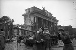 Soviet Army photographer Yevgeny Khaldei in Berlin, Germany, May 1945; note Brandenburg Gate in background