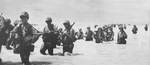 Men of 3rd Battalion, 6th Marine Division wading ashore at Green Beach, Betio, Tarawa Atoll, 22 Nov 1943