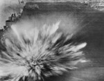 Bomb dropped by Japanese pilot Kazumi Horie exploding on the flight deck of USS Enterprise during Battle of the Eastern Solomons, 24 Aug 1942