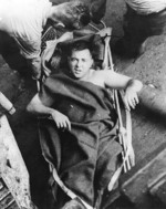 Injured man aboard USS Minneapolis, 1 Dec 1942