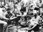US Marines instructing Filipino aviation cadets on the use of a water-cooled .30 caliber Browning machine gun, circa 1941