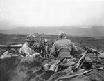 A machine gun nest and its resting crew, Iwo Jima, circa Feb-Mar 1945