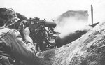 An US Marine firing a Browning M1917 machine gun, Iwo Jima, Japan, 19  Feb 1945
