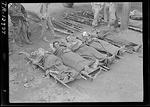 Wounded Marines waiting to be transported to Guam, Iwo Jima, Mar 1945