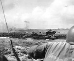 Men of US 4th Marine Division landing on Iwo Jima, Japan, 19 Feb 1945