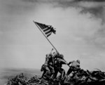 Raising the US flag atop Mount Suribachi by Joe Rosenthal, Iwo Jima, Japan, 23 Feb 1945