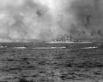 LVT landers carried US Marines past battleship Tennessee toward Iwo Jima, 19 Feb 1945
