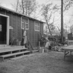 Mrs. T. Arima working in her garden at Jerome War Relocation Center, Arkansas, United States, 17 Nov 1942, photo 2 of 2