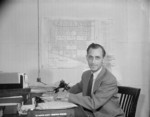 Project Director Paul Taylor of Jerome War Relocation Center at his office, Arkansas, United States, 18 Nov 1942, photo 1 of 2