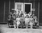 Charles Lynn (center) with his newspaper staff, Jerome War Relocation Center, Arkansas, United States, 16 Nov 1942