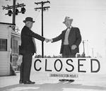 Japanese-American Shuichi Yamamoto shaking hands with camp director James Lindley as Granada Relocation Center in Amache, Colorado, United States closed down, 15 Oct 1945