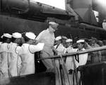 Douglas MacArthur disembarking destroyer USS Buchanan at Yokohama, Japan after being transferred ashore from the USS Missouri where the Japanese surrender was signed, 2 Sep 1945