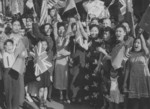 Chinese-Canadians celebrating victory over Japan, 16 Aug 1945; note flags of Canada, United States, Soviet Union, United Kingdom, and China being displayed