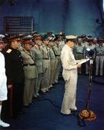 General Douglas MacArthur speaking aboard USS Missouri, Tokyo Bay, Japan, 2 Sep 1945, 1 of 4