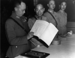 General First Class He Yingqin, General Second Class Gu Zhutong, and Lieutenant General Xiao Yisu inspecting the Japanese instrument of surrender, Nanjing, China, 9 Sep 1945